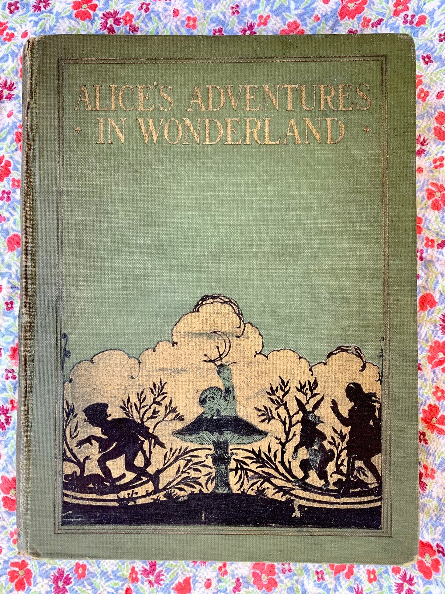 Alice's Adventures in Wonderland by Lewis Carroll. Published by Dodd, Mead & Company, 1922. Contains many colored illustrations